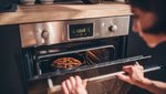 woman-checking-pie-in-oven-800x450.jpg
