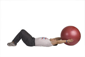 Lying Knee to Arm Crunches with Exercise Ball