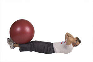 Leg Extension Crunches with Exercise Ball