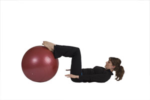 Extension des jambes avec ballon de gymnastique