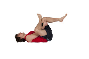 Lying Crossover Glute Stretch