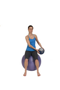 Diagonal Lift with Medicine Ball on Exercise Ball