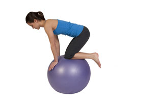 Single Arm Raise Balance Exercise on Exercise Ball