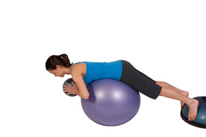 Lower Back Exercise with Medicine Ball on Exercise Ball